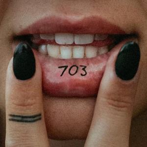 703
