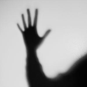 a man in the shadows