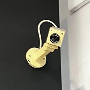 Yellow CCTV Camera