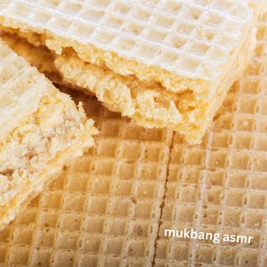 Eating Cream Filled Wafer Cookie