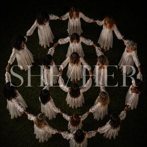 SHE/HER