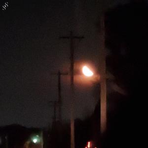 when the moon glows orange