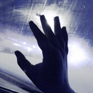 handprints on the frosted glass