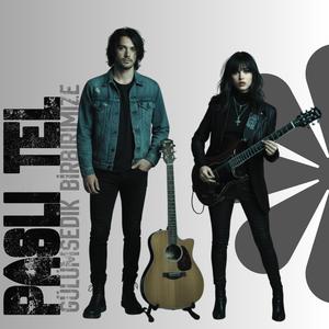 Gülümsedik Birbirimize