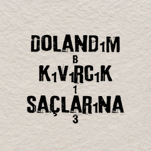 Dolandım kıvırcık saçlarına