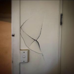 PAINTING OVER THE CRACKS