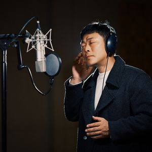 你的眼角流着我的泪