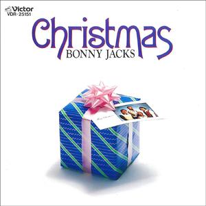 ママがサンタにキッスした