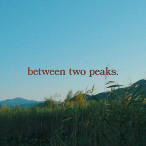 Between Two Peaks