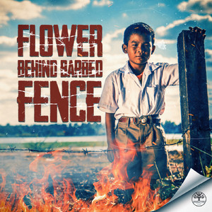 Flower Behind Barbed Fence