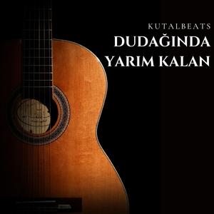 Dudağında Yarım Kalan