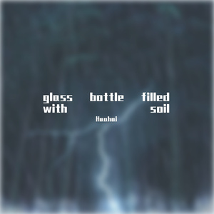 glass bottle filled with soil