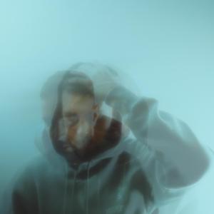 Överlevnadsskuld (feat. John Vincent)