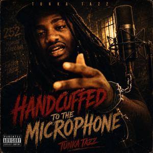 Handcuffed To The Microphone