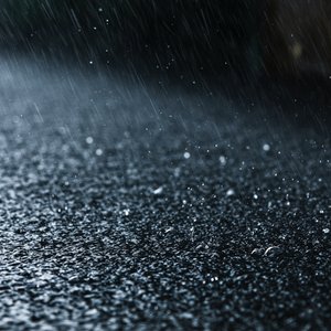 Slow Rainfall on Parking Lot