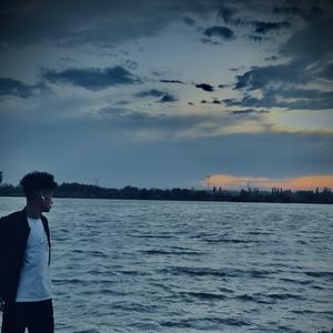 Tonushluq Natonux Qiz (熟悉的陌生女孩)