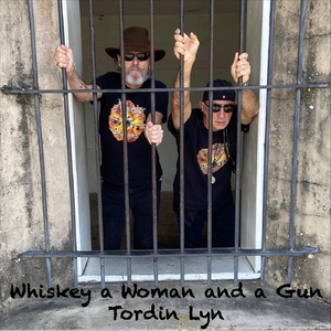 Whiskey a Woman and a Gun