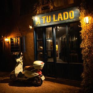 A TU LADO