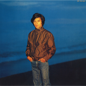 つめたい雨が窓を