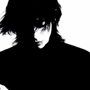 黄昏把影子拉成思念的弦