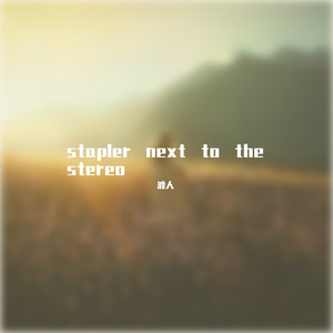 stapler next to the stereo