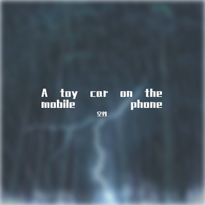 A toy car on the mobile phone