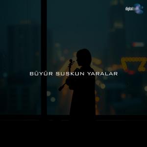 büyür suskun yaralar