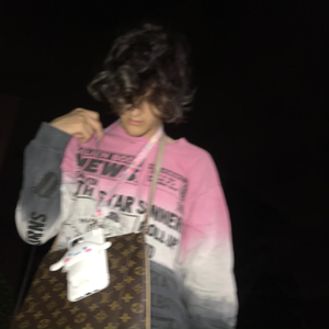 Strapped In The Club (feat. Lil Tracy)