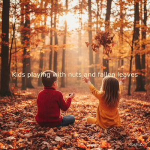 Kids playing with nuts and fallen leaves