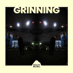 Grinning
