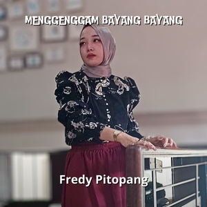 Menggenggam Bayang Bayang