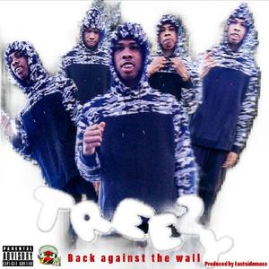 back against the wall