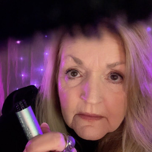 Spraying Charlotte Tilbury Setting Spray