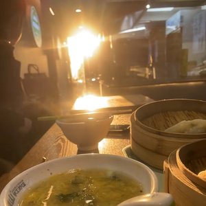 你只问我粥可温否