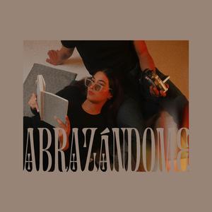 Abrazándome