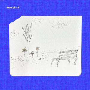 the bench, a tree, and three flowers