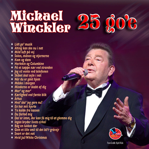 På et tæppe nær ved stranden