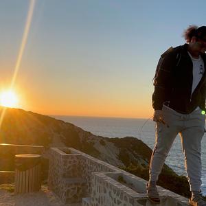 New him by his curly hair