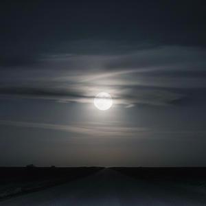 BENEATH THE LOW MOON