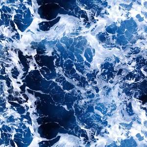 海浪散成繁星向日落奔去