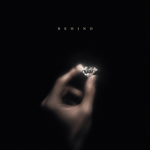 Behind