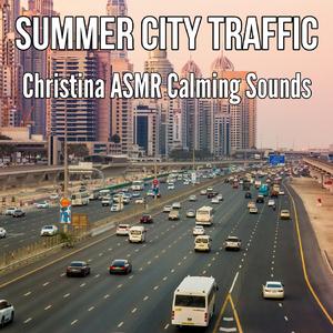 Large Cars Passsing on Busy Street