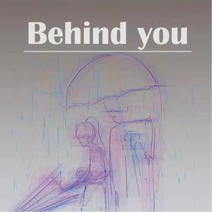 Behind you
