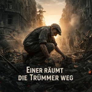 Einer räumt die Trümmer weg