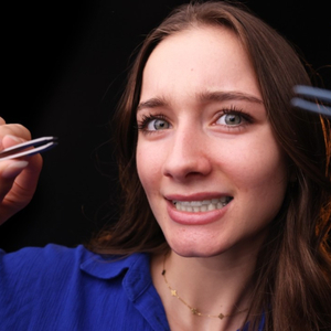 Applying Soothing Hand Cream on Face
