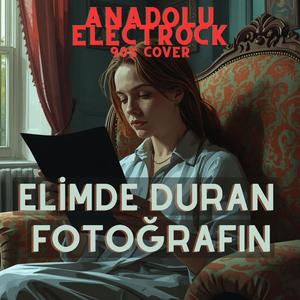 Elimde Duran Fotoğrafın