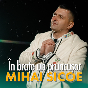 În brațe un pruncușor