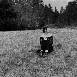 Anguish Alone in a Black Dress