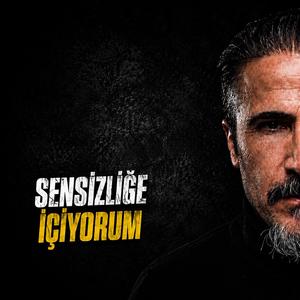 Sensizliğe içiyorum