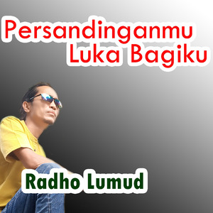Persandinganmu Luka Bagiku